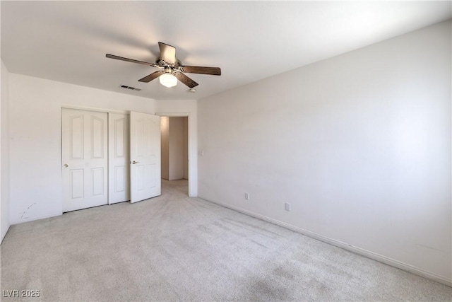2728 Aspen Wood Ave, Henderson, NV 89074 - unfurnished bedroom featuring light colored carpet, a closet, and ceiling fan