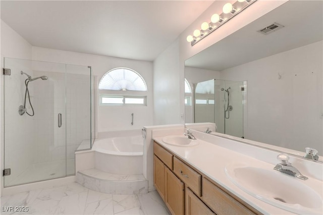 2728 Aspen Wood Ave, Henderson, NV 89074 - full bath featuring a bath, a stall shower, double vanity, and marble look tiles