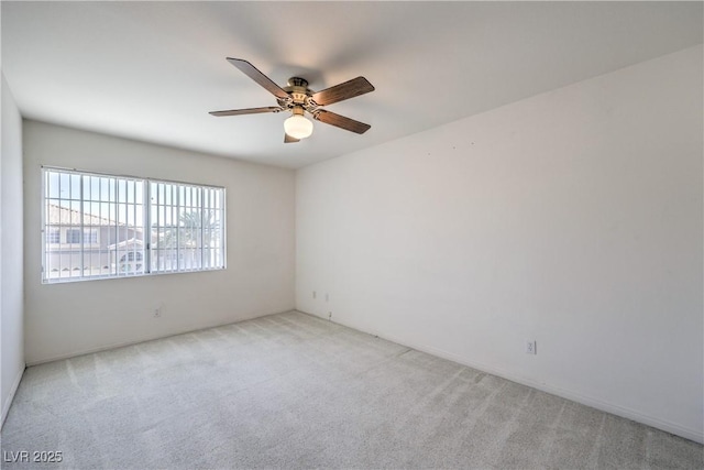 2728 Aspen Wood Ave, Henderson, NV 89074 - spare room featuring light colored carpet and ceiling fan