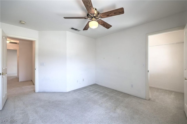 2728 Aspen Wood Ave, Henderson, NV 89074 - unfurnished bedroom with light colored carpet and a ceiling fan