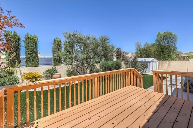 2728 Aspen Wood Ave, Henderson, NV 89074 - wooden deck featuring a storage shed and a fenced backyard