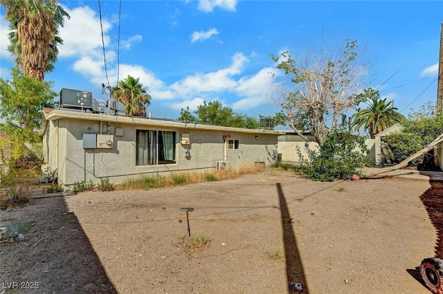 1804 David Ave, Las Vegas, NV 89101 - rear view of house with stucco siding and solar panels