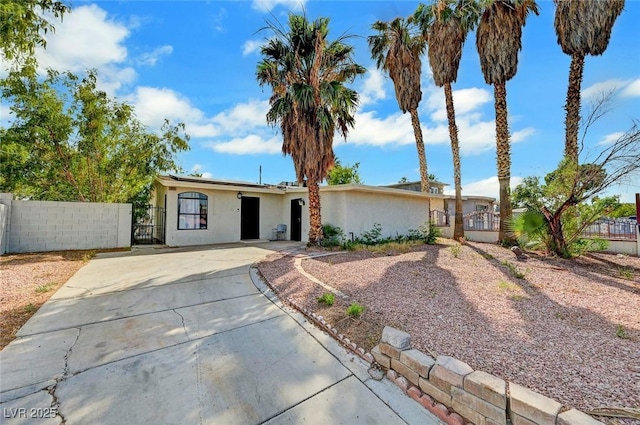 1804 David Ave, Las Vegas, NV 89101 - view of front of property with a gate, stucco siding, and concrete driveway