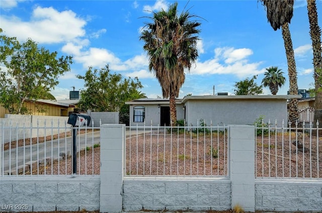 1804 David Ave, Las Vegas, NV 89101 - view of front of property with a fenced front yard, solar panels, and stucco siding
