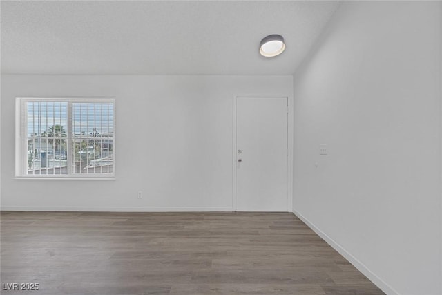 6808 Waterhen Cir, Las Vegas, NV 89108 - spare room with wood finished floors and baseboards