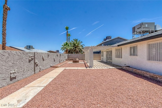 6808 Waterhen Cir, Las Vegas, NV 89108 - fenced backyard featuring a patio