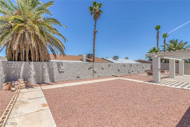 6808 Waterhen Cir, Las Vegas, NV 89108 - fenced backyard with a patio