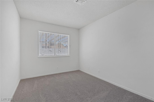 6808 Waterhen Cir, Las Vegas, NV 89108 - carpeted spare room featuring a textured ceiling and baseboards