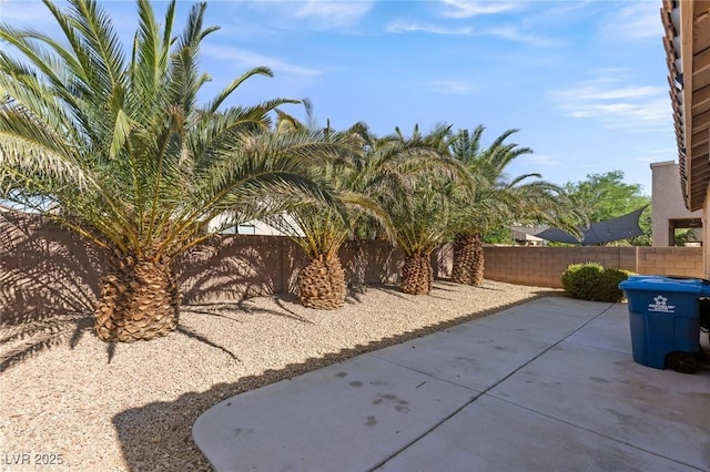 4043 Lilac Creek Ct, Las Vegas, NV 89122 - fenced backyard featuring a patio area