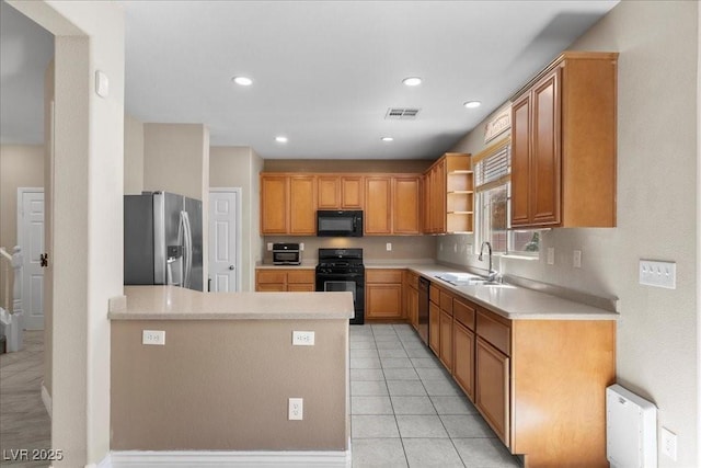 7818 Brodie Castle Ct, Las Vegas, NV 89166 - kitchen with black appliances, open shelves, light countertops, light tile patterned flooring, and a peninsula