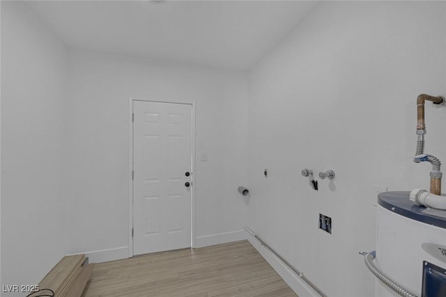2005 Jansen Ave, Las Vegas, NV 89101 - laundry room with water heater, light wood finished floors, and hookup for a washing machine
