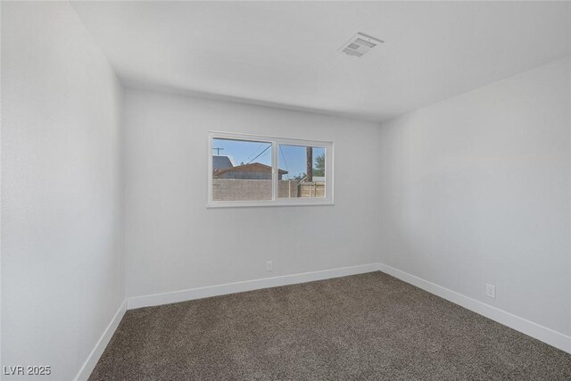 2005 Jansen Ave, Las Vegas, NV 89101 - empty room featuring dark colored carpet