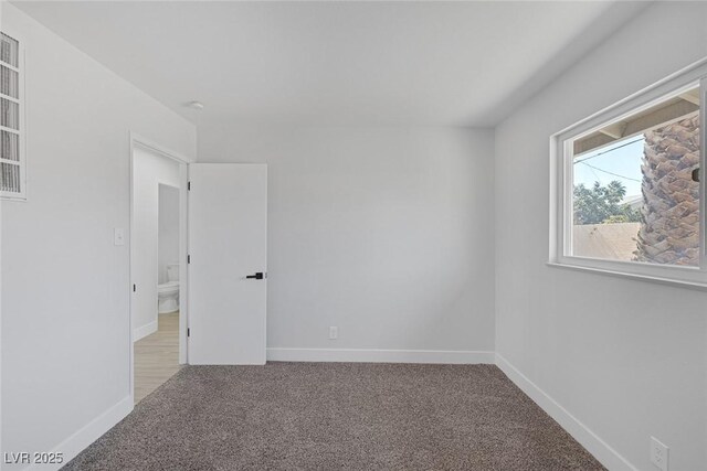 2005 Jansen Ave, Las Vegas, NV 89101 - carpeted empty room featuring baseboards