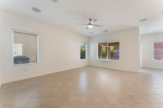 5735 Oak Bend Dr, Las Vegas, NV 89135 - empty room with a ceiling fan and light tile patterned floors