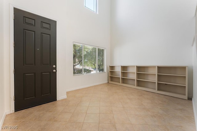5735 Oak Bend Dr, Las Vegas, NV 89135 - foyer with a towering ceiling and light tile patterned flooring