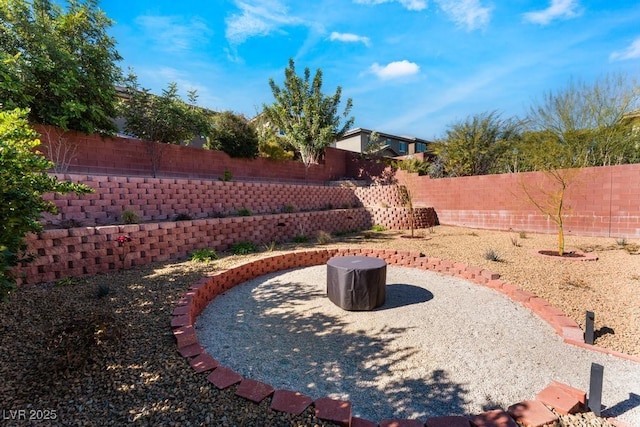 5735 Oak Bend Dr, Las Vegas, NV 89135 - fenced backyard with a patio area