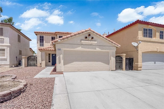 638 Ribbon Grass Ave, Las Vegas, NV 89183 - mediterranean / spanish home with a gate, stucco siding, concrete driveway, a garage, and a tiled roof