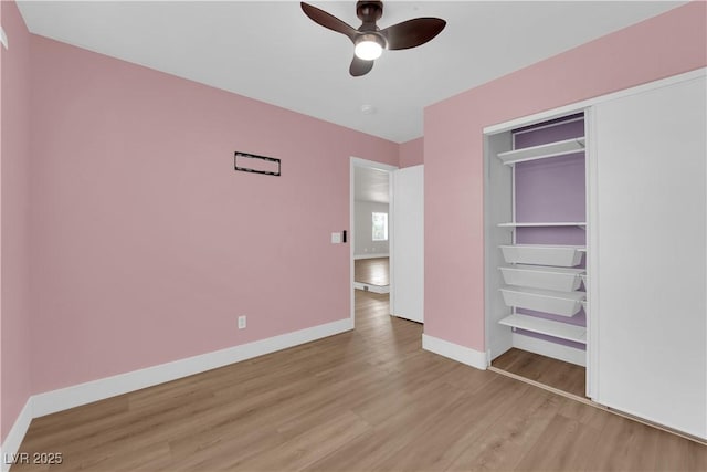 638 Ribbon Grass Ave, Las Vegas, NV 89183 - unfurnished bedroom with light wood-style flooring, a closet, and ceiling fan