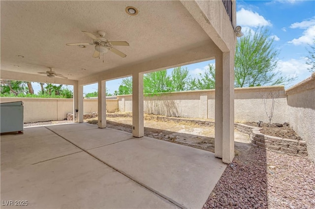 638 Ribbon Grass Ave, Las Vegas, NV 89183 - fenced backyard featuring a ceiling fan and a patio area