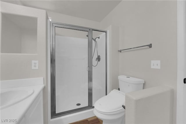 638 Ribbon Grass Ave, Las Vegas, NV 89183 - bathroom with a stall shower, vanity, and wood finished floors