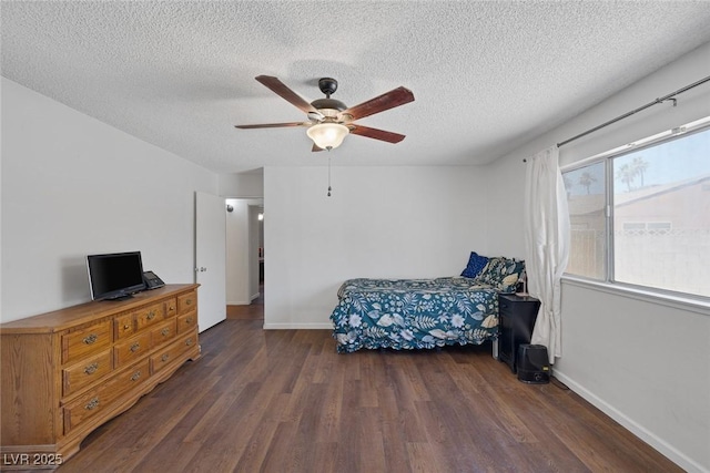 4458 El Quinta Ct, Las Vegas, NV 89121 - bedroom with wood finished floors, a textured ceiling, and ceiling fan