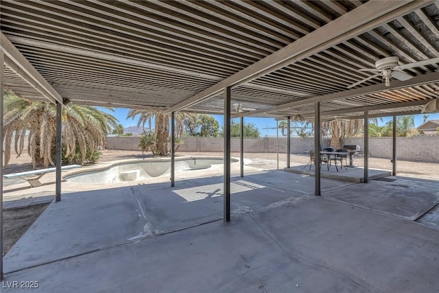 4458 El Quinta Ct, Las Vegas, NV 89121 - fenced backyard with a patio area, outdoor dining space, and ceiling fan
