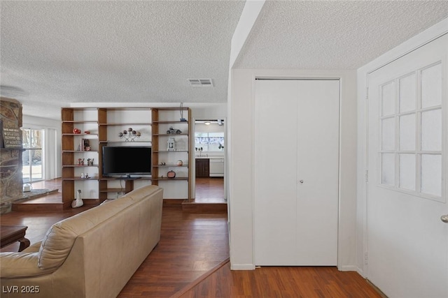4458 El Quinta Ct, Las Vegas, NV 89121 - living room with a textured ceiling and wood finished floors