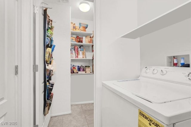 8949 Merry Mullion Ct, Las Vegas, NV 89149 - laundry area featuring light tile patterned flooring and washer and clothes dryer