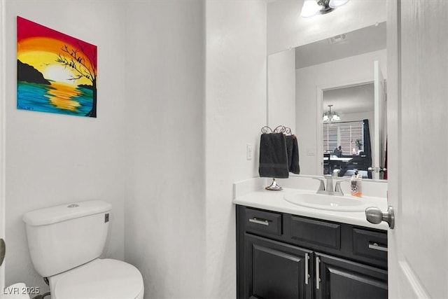 8949 Merry Mullion Ct, Las Vegas, NV 89149 - half bathroom featuring toilet and vanity