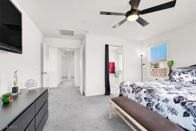 8949 Merry Mullion Ct, Las Vegas, NV 89149 - bedroom featuring light colored carpet, ceiling fan, and ensuite bath