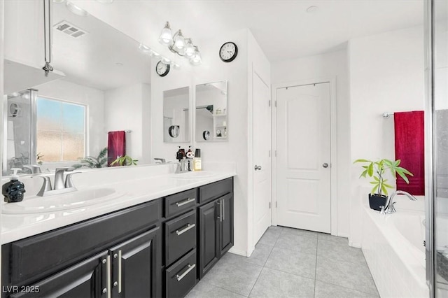 8949 Merry Mullion Ct, Las Vegas, NV 89149 - full bathroom with double vanity, a bath, and tile patterned flooring