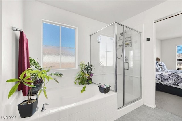 8949 Merry Mullion Ct, Las Vegas, NV 89149 - ensuite bathroom featuring a stall shower, a garden tub, and healthy amount of natural light