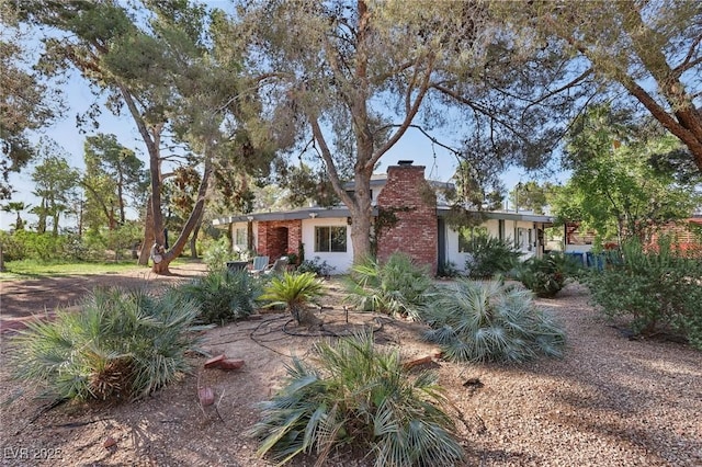 55 Siddall Ave, Las Vegas, NV 89183 - view of front of property featuring a chimney and stucco siding