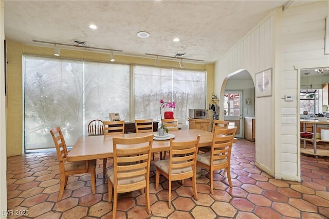 55 Siddall Ave, Las Vegas, NV 89183 - dining space with arched walkways