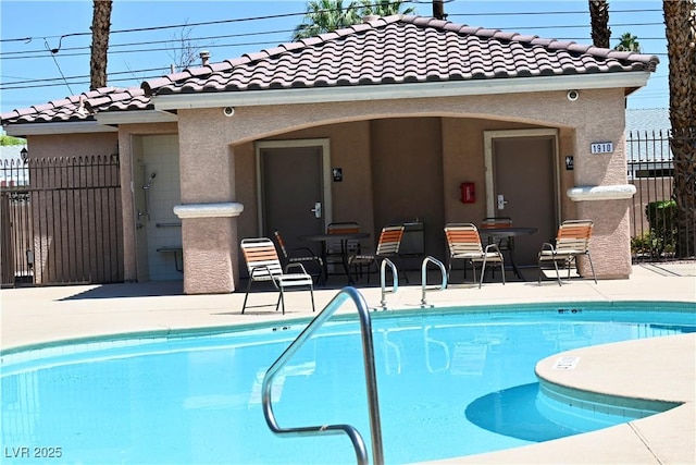 248 Crystal Rose Ct, Las Vegas, NV 89106 - community pool featuring a patio