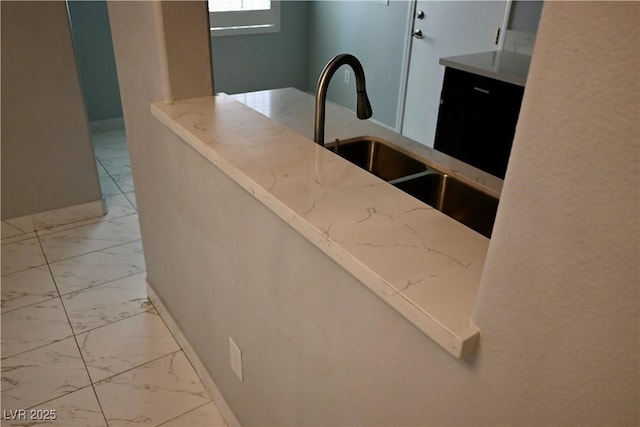 248 Crystal Rose Ct, Las Vegas, NV 89106 - kitchen with light marble finish floors and light stone countertops