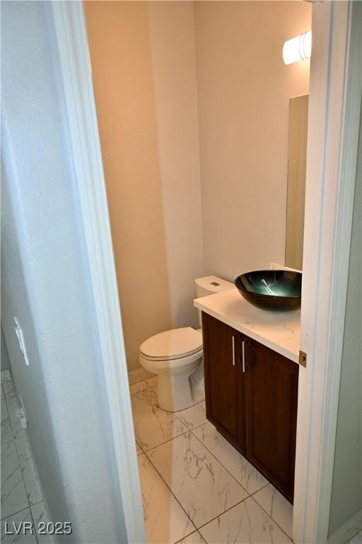 248 Crystal Rose Ct, Las Vegas, NV 89106 - bathroom with marble look tile flooring and vanity