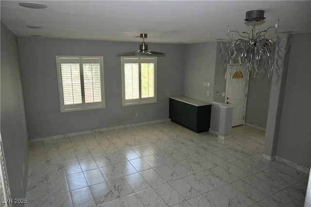 248 Crystal Rose Ct, Las Vegas, NV 89106 - unfurnished room featuring a ceiling fan and light marble finish flooring