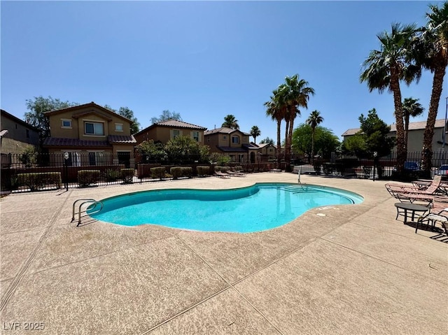 248 Crystal Rose Ct, Las Vegas, NV 89106 - community pool with a patio and a residential view
