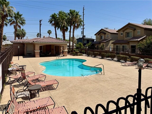 248 Crystal Rose Ct, Las Vegas, NV 89106 - community pool with a patio