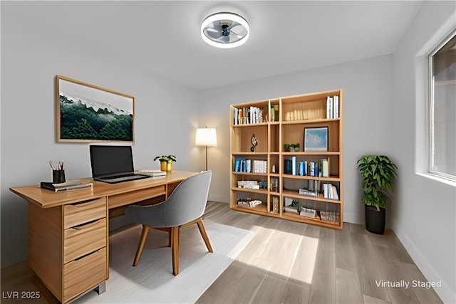 9412 Mount Cherie Ave Unit 102, Las Vegas, NV 89129 - office with light wood-style floors and ceiling fan