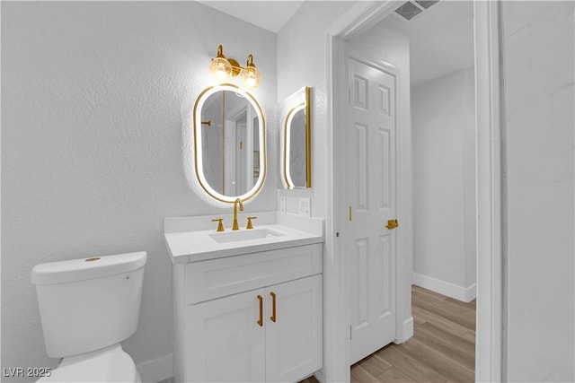 9412 Mount Cherie Ave Unit 102, Las Vegas, NV 89129 - bathroom featuring vanity and wood finished floors