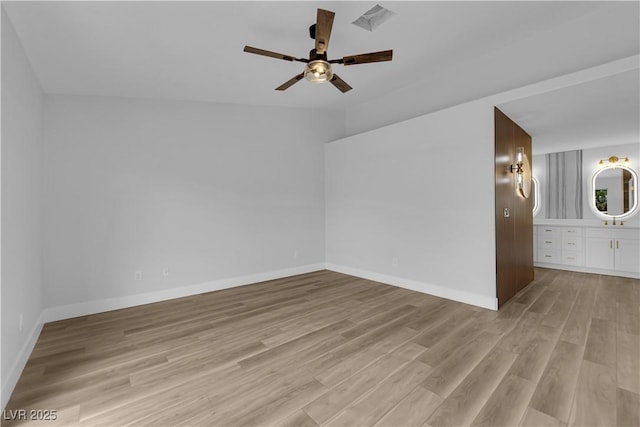 9412 Mount Cherie Ave Unit 102, Las Vegas, NV 89129 - additional living space with a ceiling fan and light wood-style flooring