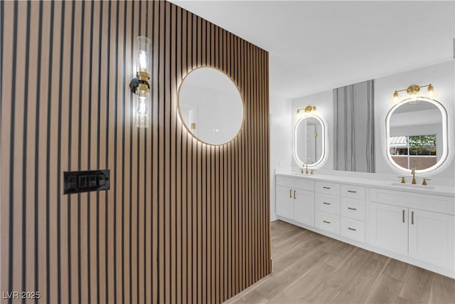 9412 Mount Cherie Ave Unit 102, Las Vegas, NV 89129 - full bathroom featuring double vanity and wood finished floors