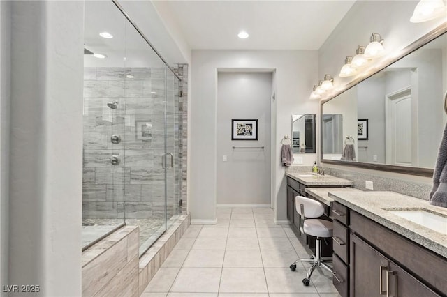 6315 Carol Butte Ct, Las Vegas, NV 89141 - bathroom featuring vanity, a stall shower, tile patterned flooring, and recessed lighting