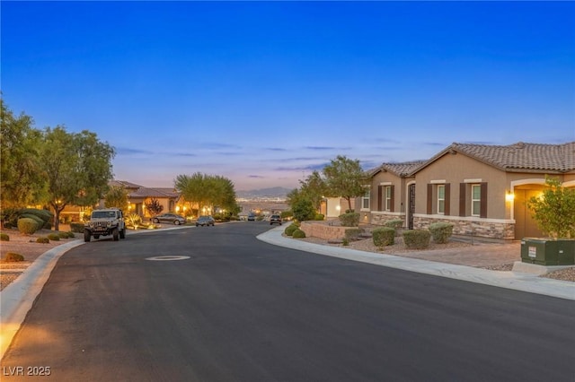 6315 Carol Butte Ct, Las Vegas, NV 89141 - view of asphalt street featuring curbs and sidewalks