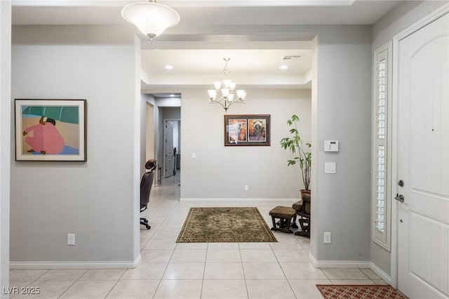 6315 Carol Butte Ct, Las Vegas, NV 89141 - entryway featuring a raised ceiling, a chandelier, light tile patterned floors, and recessed lighting