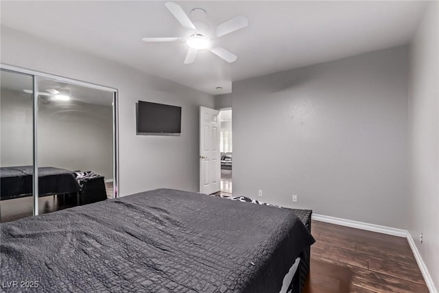 6307 Dusty Mile Ct, North Las Vegas, NV 89031 - bedroom with dark wood finished floors, a closet, and ceiling fan