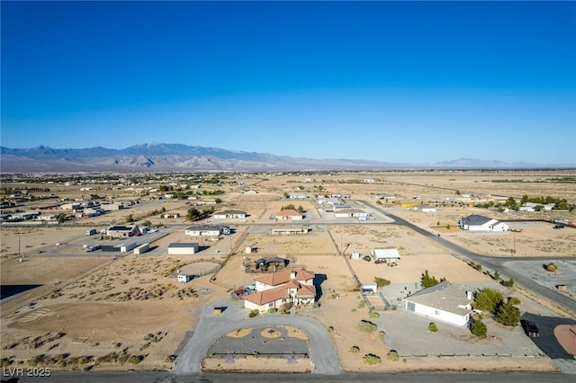 3821 Tumbleweed Ave, Pahrump, NV 89048 - aerial view of property and surrounding area with mountains and nearby suburban area