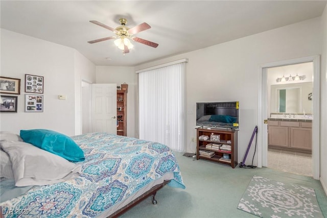 3821 Tumbleweed Ave, Pahrump, NV 89048 - carpeted bedroom featuring ceiling fan and ensuite bath
